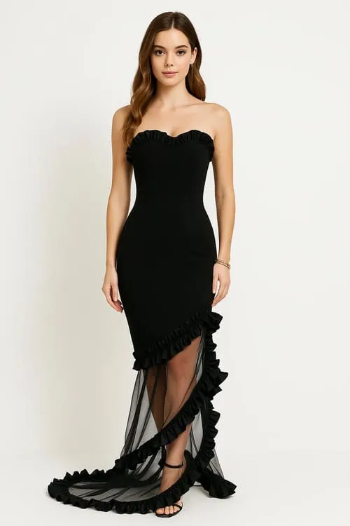 Black strapless bandage dress with ruffled details and a sheer train