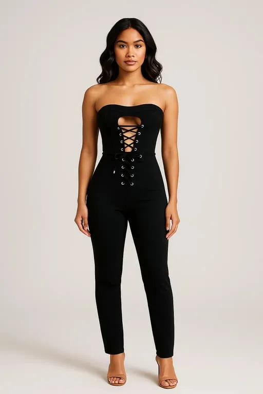 A model in a black bandage jumpsuit with corset lacing